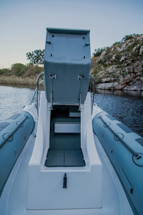 Storage under the helm seat