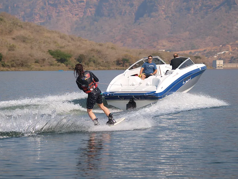 Wakeboarding behind the Odyssey 650 Sundeck boat