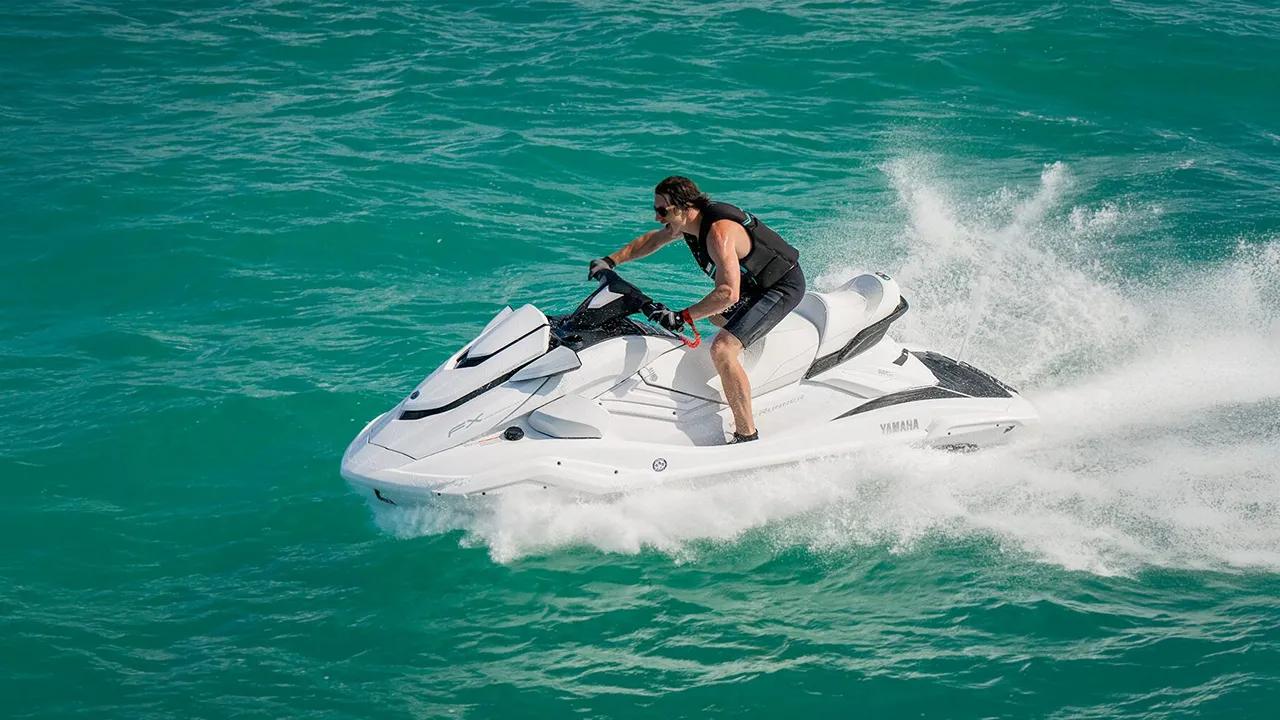 Man racing on a white ejt ski