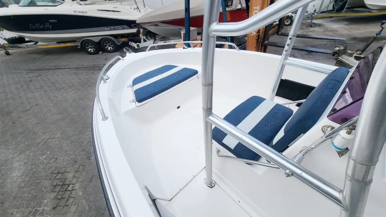Bow view of white and blue boat