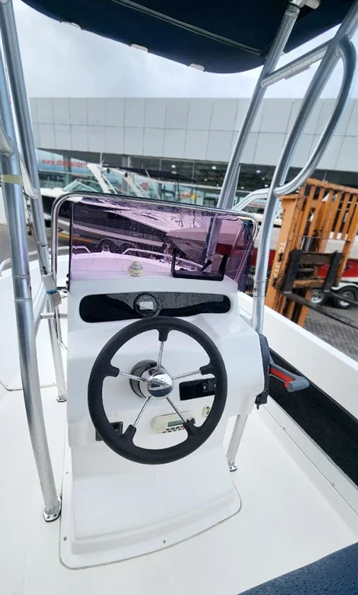 Console with steering wheel