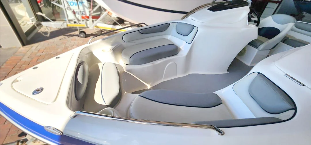 Bow seating of a white and blue boat
